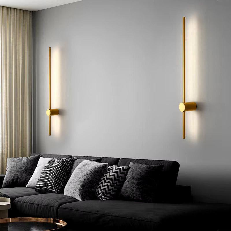 gold wall lamp in warm white for living rooms