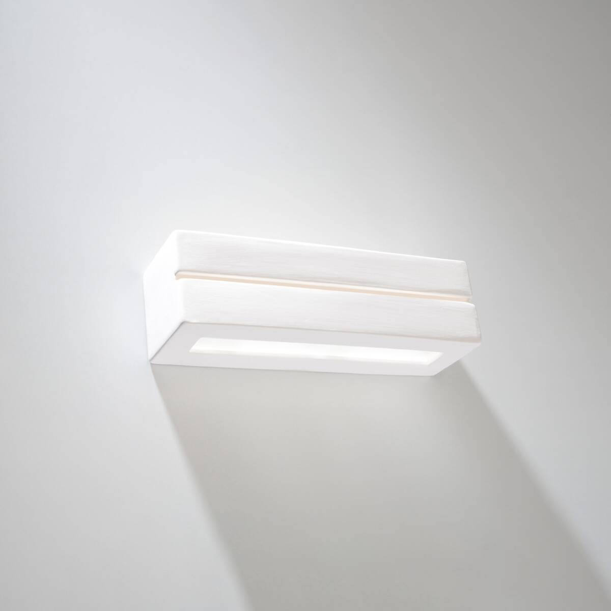 Light-on Close-up of White Ceramic Block Wall Lamp Light for Bathroom, Bedroom, Kitchen, and Living Room