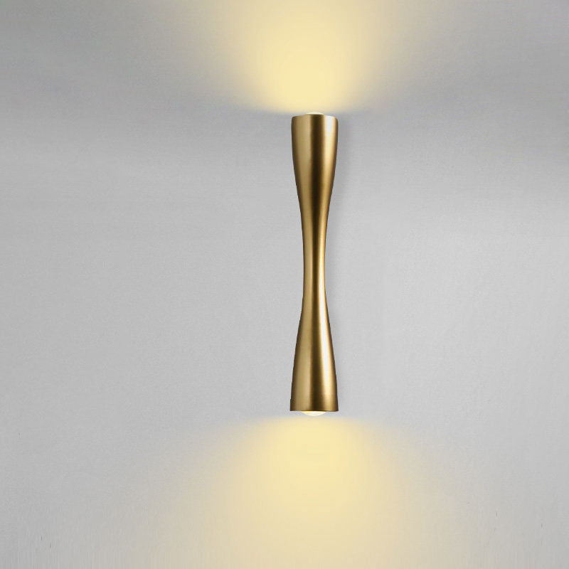 Golden Novu Minimalist Wall Lamp for Kitchen, Dining Room, Living Room, and Bedroom placed on plain gray wall