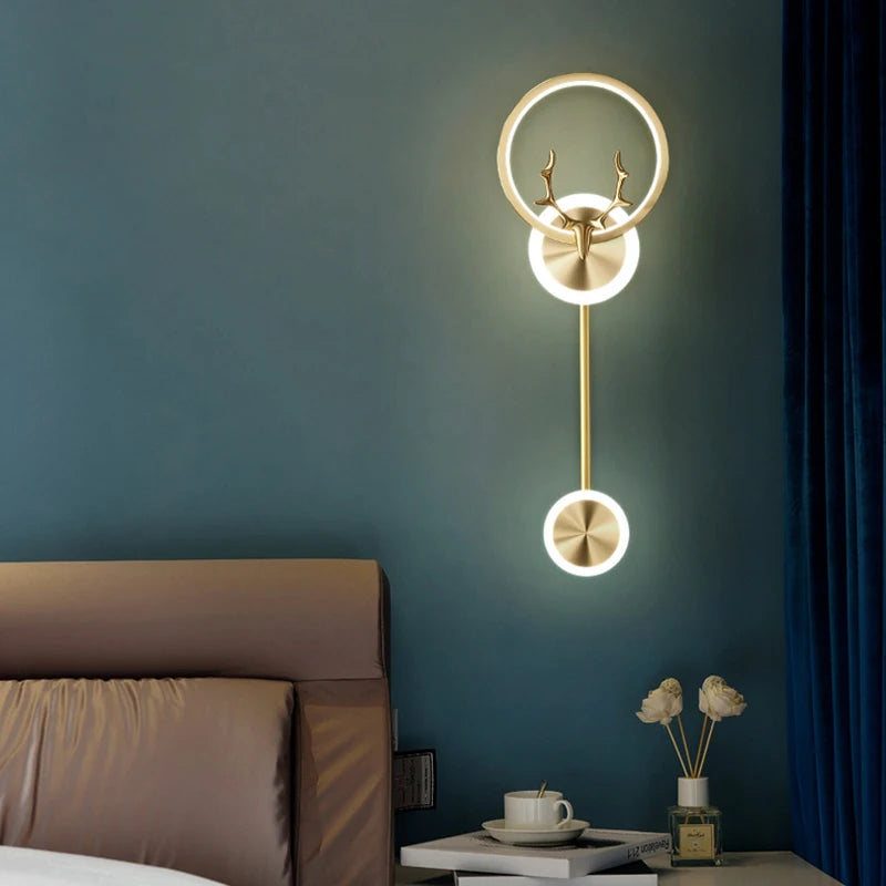 Light-on Stunning Golden Deer LED Wall Lamp placed aside to the Bed