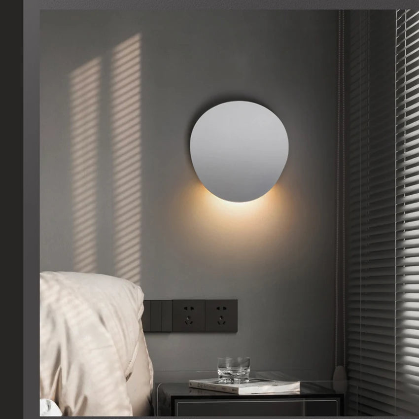 White Disc LED Wall Lamp wall design for bathroom, bedroom, kitchen and living room placed on black wall