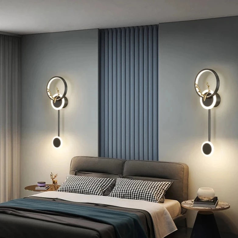 Set of 2 Light-on Black Deer LED Wall Lamp placed at both sides of the Bed