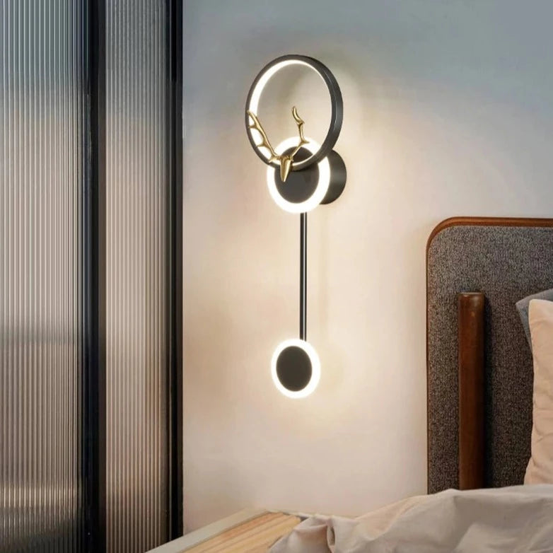 Light-on Black Deer LED Wall Lamp placed aside to the Bed