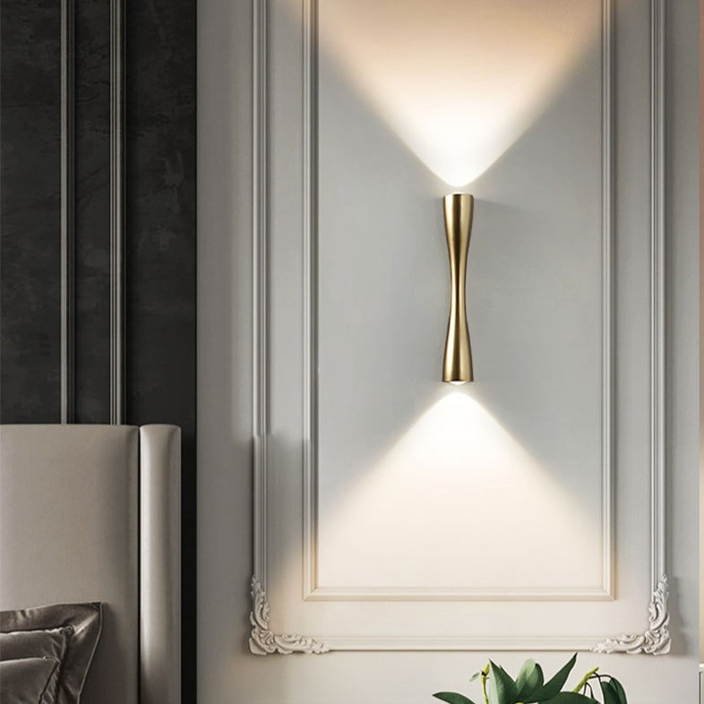 Golden Novu Minimalist Wall Lamp for Kitchen, Dining Room, Living Room, and Bedroom placed on fancy white wall